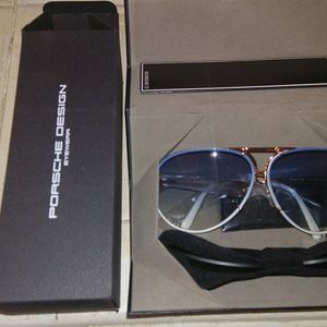 PORSCHE DESIGN TITANIUM FRAMES AND CASE.